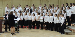 The Greene County fifth grade choir sang in two-part harmony Tuesday evening. The choir is pictured singing "Penny Whistle" with extra accompaniment by Miss Turner and sixth grader Carter Morton. Director is Brenda Roberts.