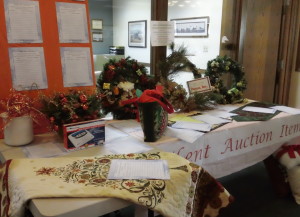 Silent auction items are on display at the Grand Junction office of Peoples Trust  Savings Bank.