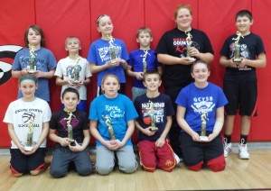 First place winners in the Hoop Shoot are (back, from left) Rilee Jordan, Logan Woodruff, Talia Schon, Karter Kennebeck, Kaitlyn McColle and Austin Delp. Second place winners are (front, from left) Isabella Schroeder, Mason Happe, Emmalin Nelson, Dane Brigham and Gina Brown.