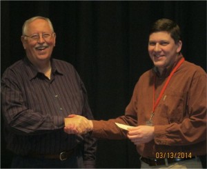 John Meyer (left) presents check to Dave Heupel