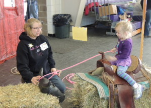 Greene County supervisor Dawn Rudolph helped young cowhands rope a steer
