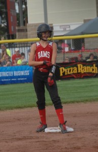 Carleigh Paup grins after a stand-up double.  Photo by Mike Ketelsen | Ketelsen Photography