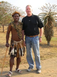 Don Feldmann with a Zulu in native dress 