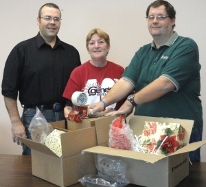 Ready to help with packaging needs are (from left) Jim Groves, Betty Niles and Tim Hegstrom