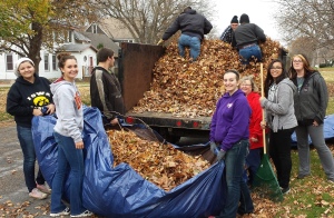 Students wait while volunteers make room for more leaves 