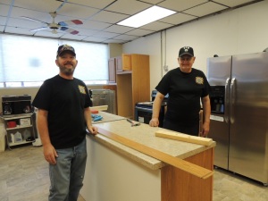 Kenny Arbuckle (left) and Don Ihken in the nearly-complete renovated kitchen