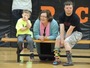 Tyler Osborn, principal Annie Smith, and P-C junior Kourtlin Thacker. Note Kourtlin's socks.