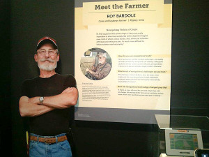 Looking at the Smithsonian Institution's life-size cutout of Roy Bardole is just like looking at the real thing. The display next to the cutout features a picture of Bardole combining corn last fall, with GPS equipment at the top of the cab.