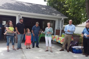 Angie Jewett (center) introduces the Saffell family with Adam Pedersen and Harry Ahrenholtz (right) 
