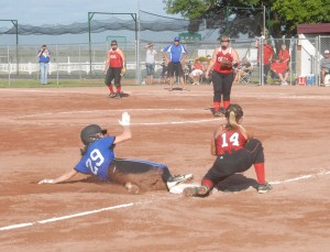 Riley Galvin was called safe at third as Carleigh Paup gets a throw after a passed ball. Galvin was the only Cadet to reach as far as third base in the 5-0 shutout.  | Ketelsen Photography