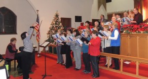 Massed community choir, directed by Sheilah Pound and accompanied by Becky Greiner