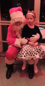 Trinity Nelson of Grand Junction visits with Santa