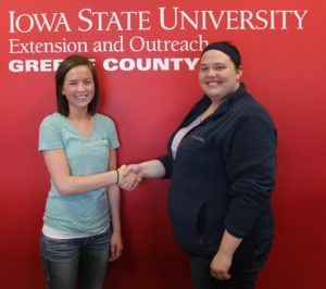 Kayla Hyett (right), Greene County youth and 4-H coordinator thanks Kayla Degner of NEW Cooperative 