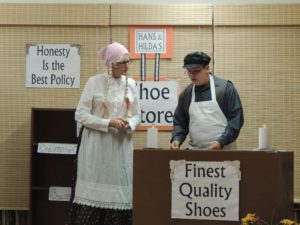 Teresa Shahan and shoemaker Avery Bardole at the library